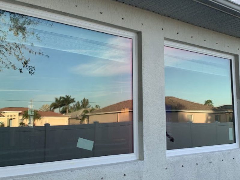 Two newly installed hurricane impact windows on a Fort Myers home